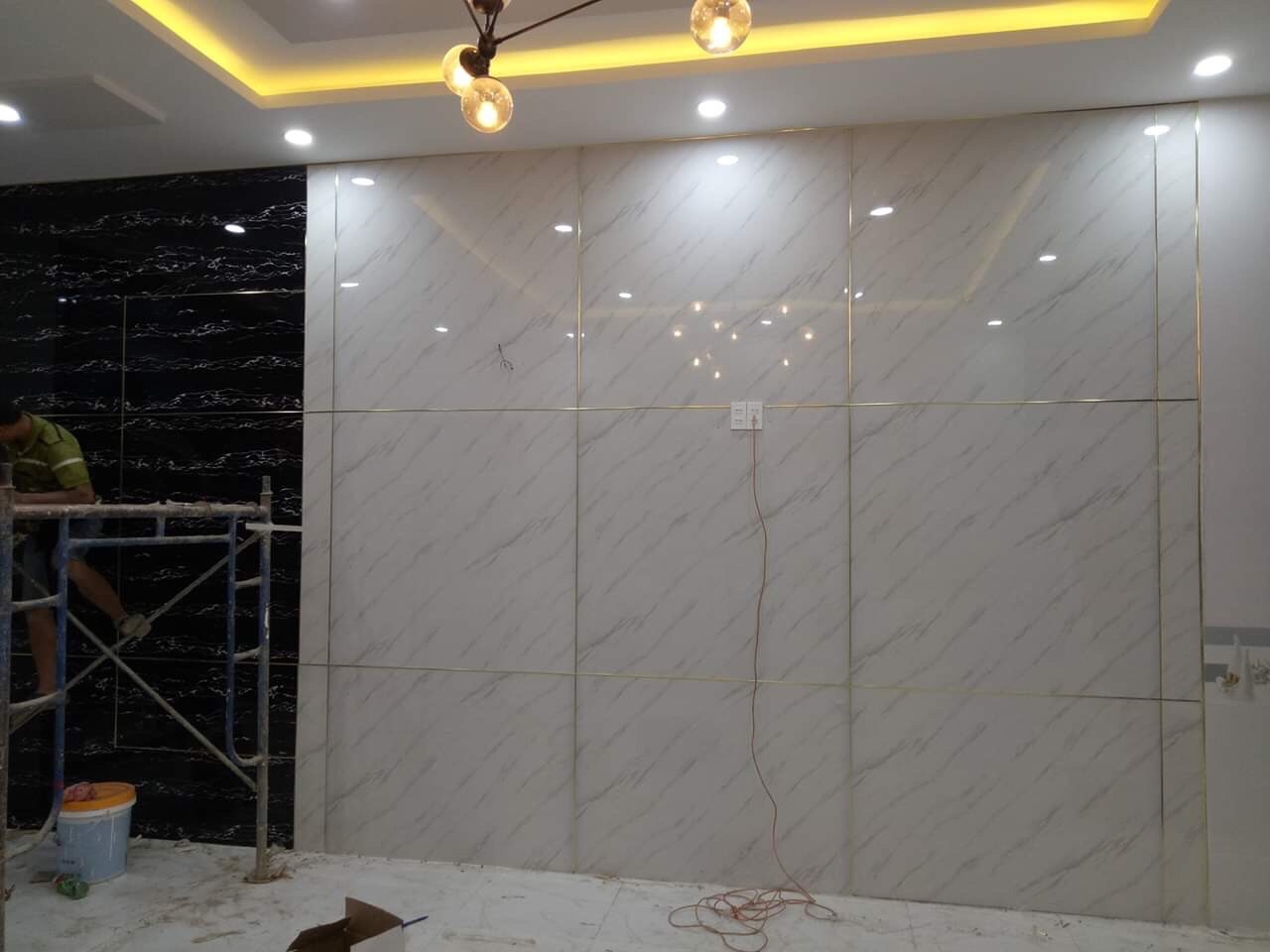 Tan Truong Minh Interior Brings a Luxurious Touch to Hotel Jardin De Neuilly with PVC Marble Panels